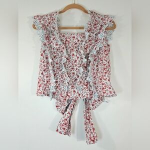 ANTHROPOLOGIE BLUE TASSEL TRINA BACK BOW FLORAL BLOUSE.